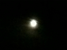 photo of full moon from bedroom window, almost midnight, a few seconds later