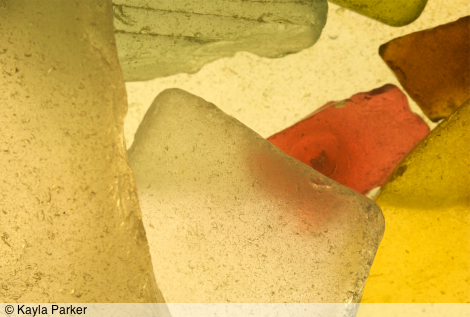 Still frame from Kayla's film Glass: the still life of carefully balanced coloured glass pieces created for the film