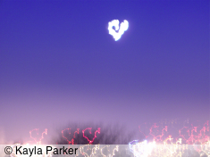 Kayla's photo of the eclipsed full moon, hand-held up on The Blockhouse, Plymouth, looking across the dockyard to SE Cornwall