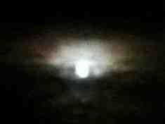 beautiful full moon with coloured ring, photo taken a few seconds later