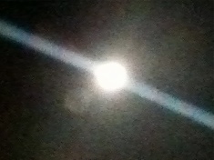 second photo of the full moon through bedroom window, taken a few seonds later