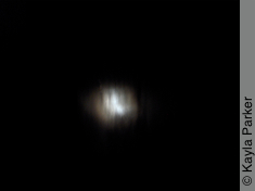 First of a second set of full moon photos - the moon through a photographic blackout curtain