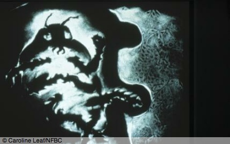 Frame from Caroline Leaf's sand-on-glass animation The Metamosphosis of Mr Samsa - at the beginning Gregor wakes to find himself transformed into a monstrous beetle